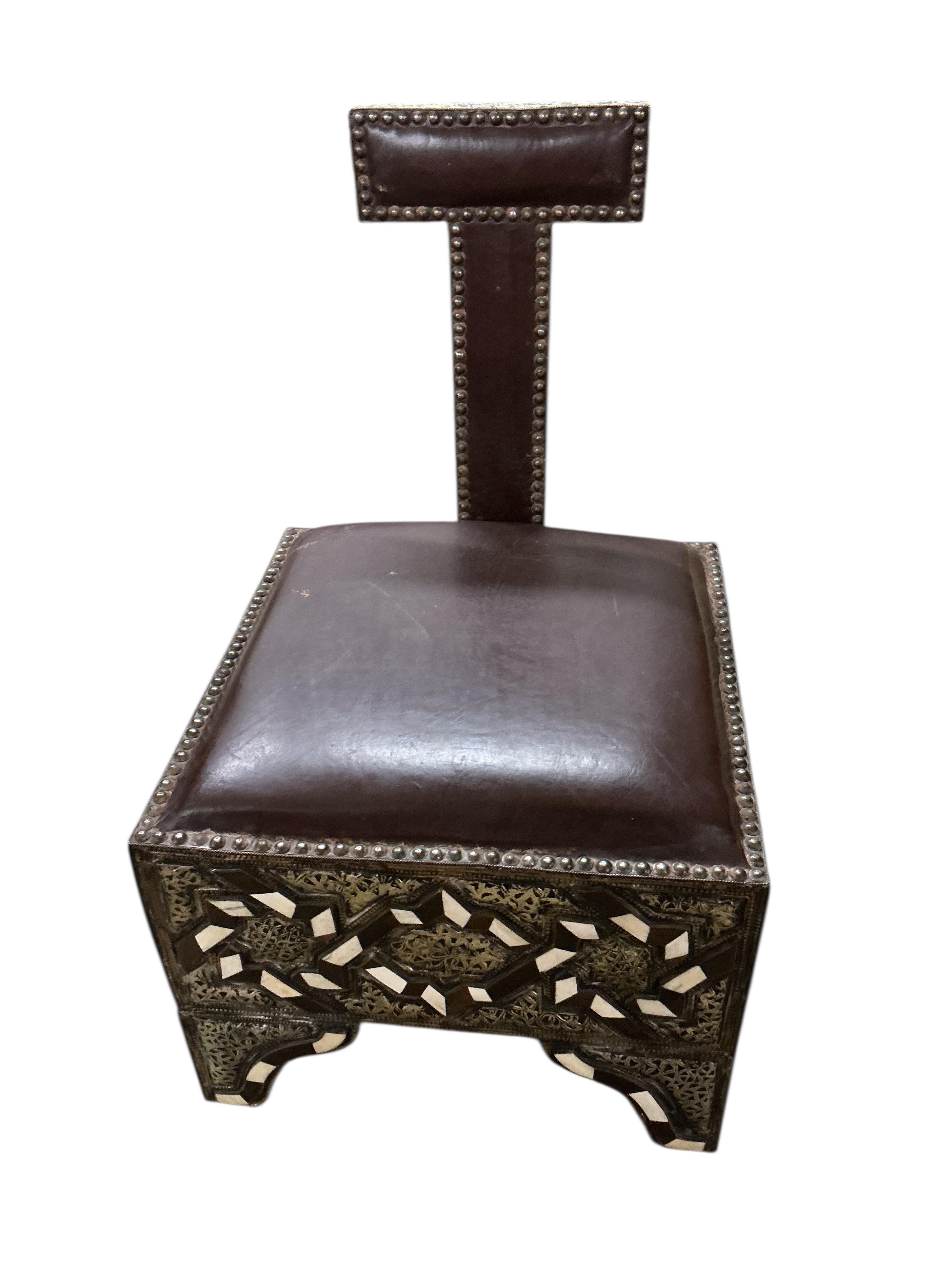 A pair of 20th century Moroccan Berber bone, horn and repousse metal chairs with seats, width 45cm, depth 45cm, height 75cm